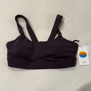 NWT plum colored Vuori stride bra